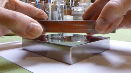Judy Larson's Flattening Metal Pieces - Method 1-preferred (washer cut from 22 gauge sheet shown), Metalwork, , Place the metal piece in the center of bottom bench block.
